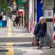 Elderly woman on sidewalk; Ginza, Tokyo