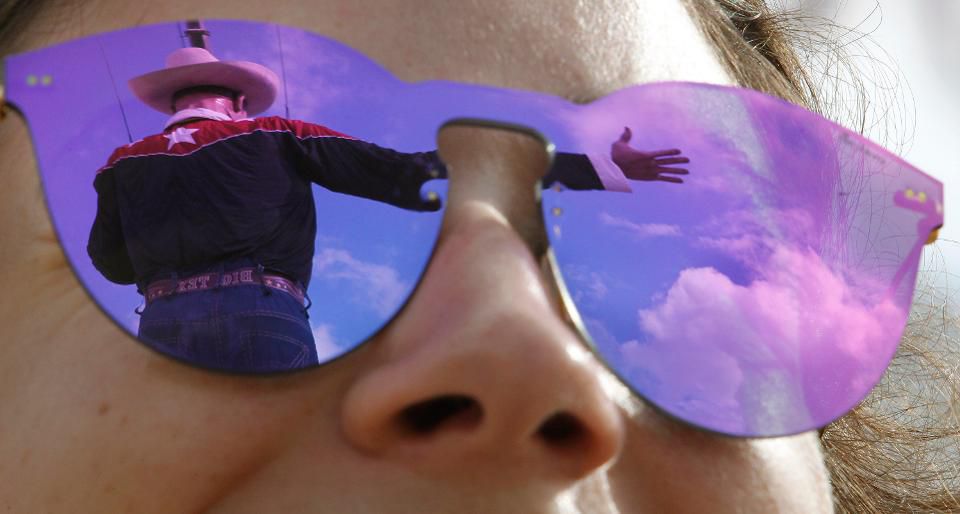 Big Tex is reflected in Simone Elices' sunglasses in Dallas on Sept. 23, 2016. (Paul Moseley/Fort Worth Star-Telegram/TNS via Getty Images)