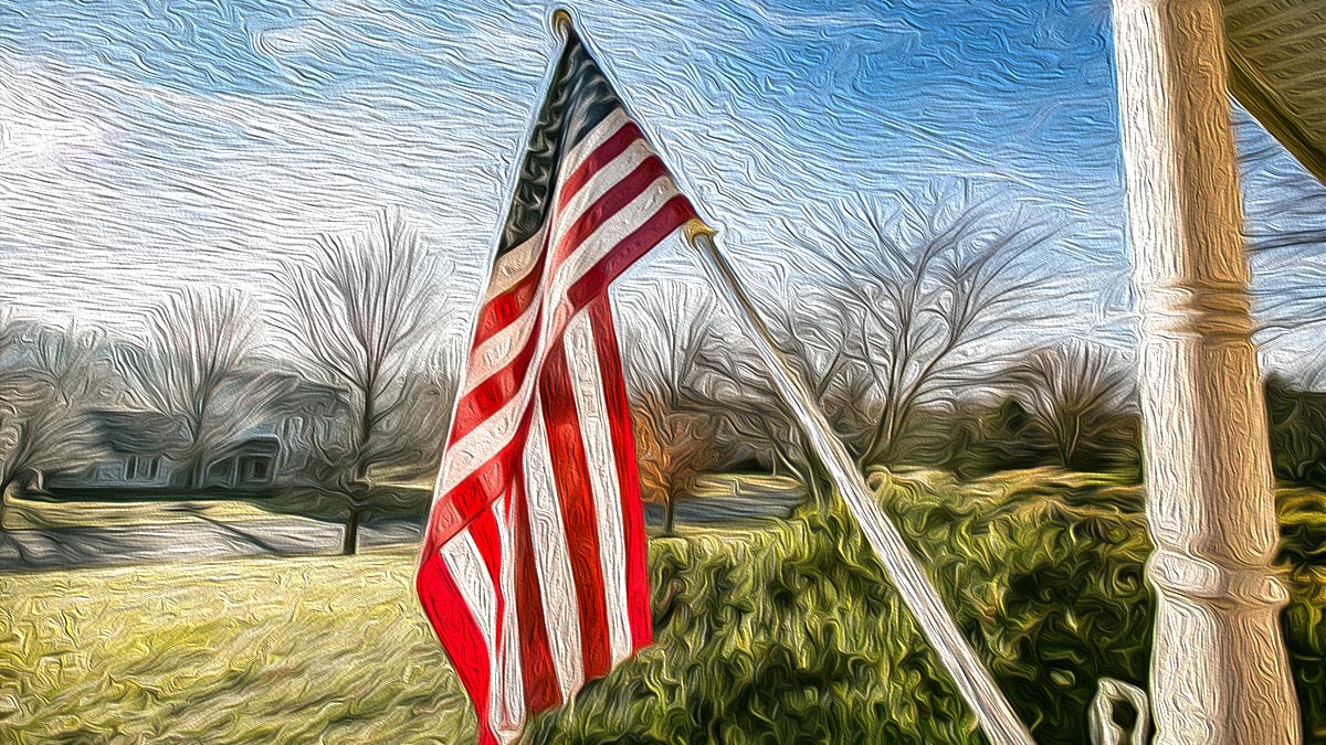 US Flag hanging on suburban porch