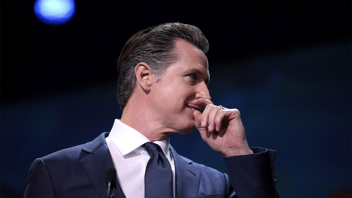 Governor Newsom aside to colleague at 2019 conference