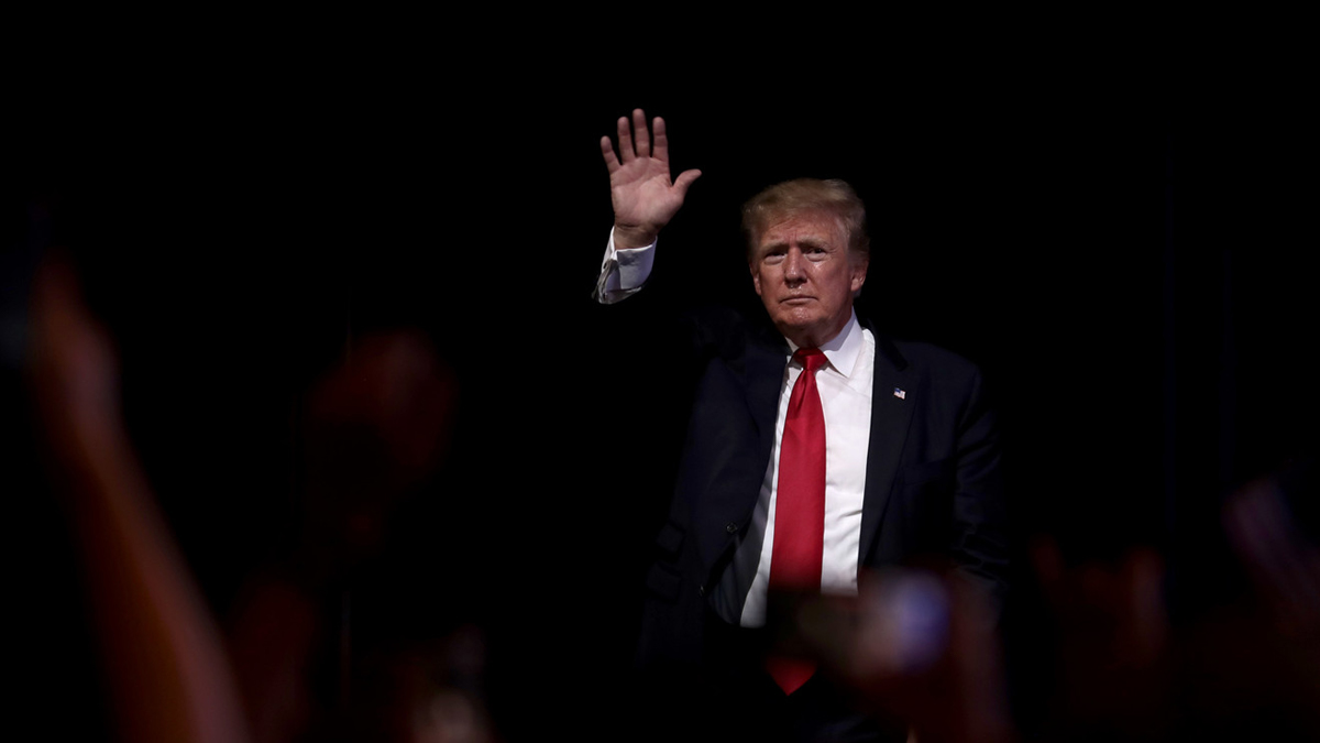 Donald Trump waves goodbye.