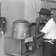 The race-centered state policies of the Jim Crow era are typified by segregated drinking fountains shown in this image.