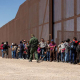 U.S. Border Patrol apprehending a large group of migrants.