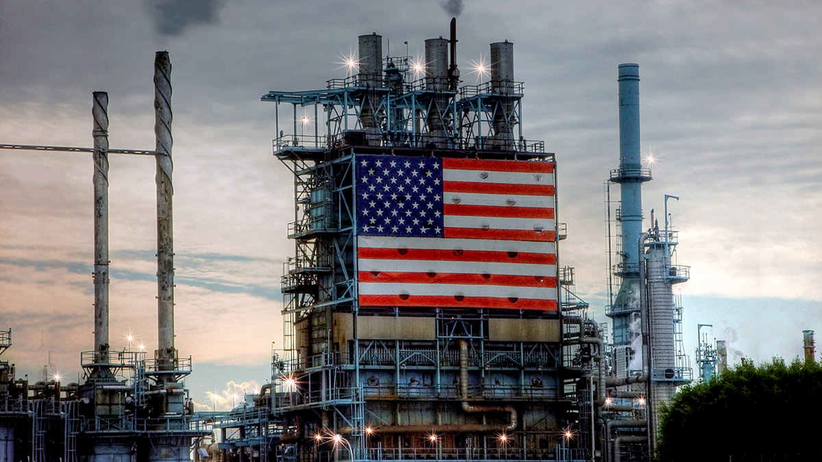 American flag hanging from an oil refinery in Carson, California