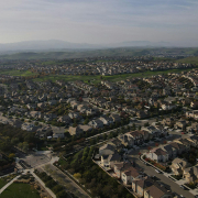 Suburban and exurban development offers a market driven solution to the global housing crisis.