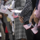 Immigrants become U.S. citizens in a naturalization ceremony
