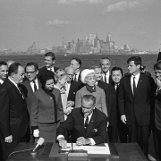 Lyndon B. Johnson signing legislation on Liberty Island, NYC