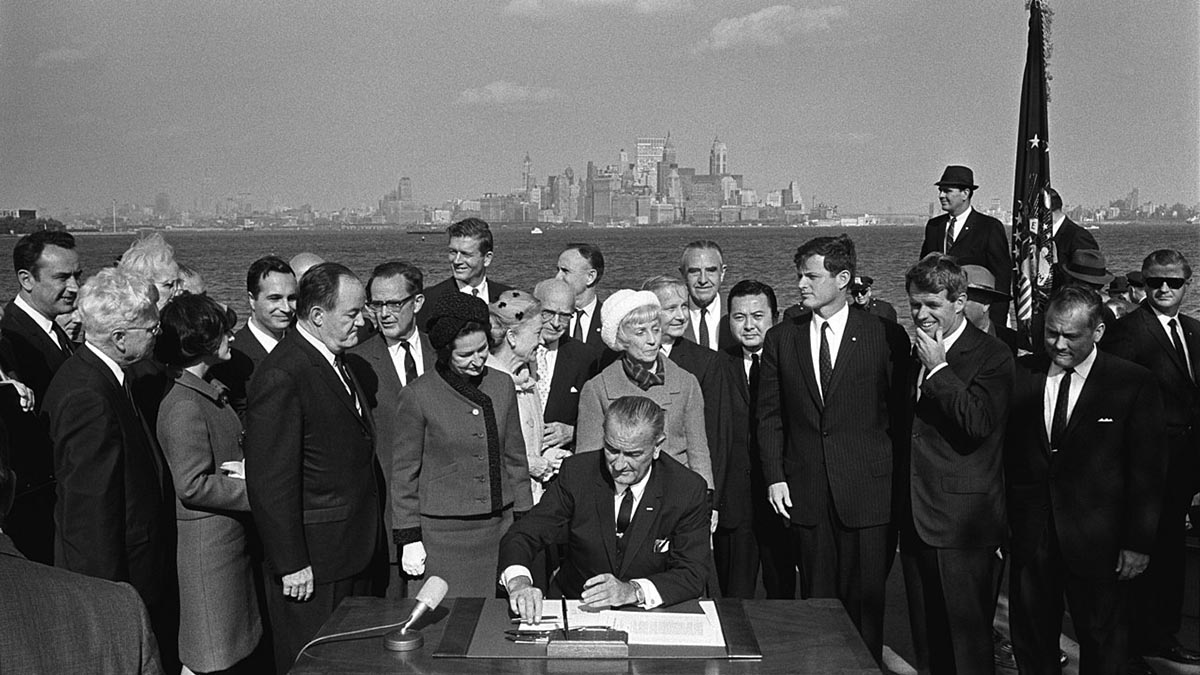 Lyndon B. Johnson signing legislation on Liberty Island, NYC