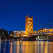 The golden Tower Bridge in Sacramento symbolizing the once golden state.